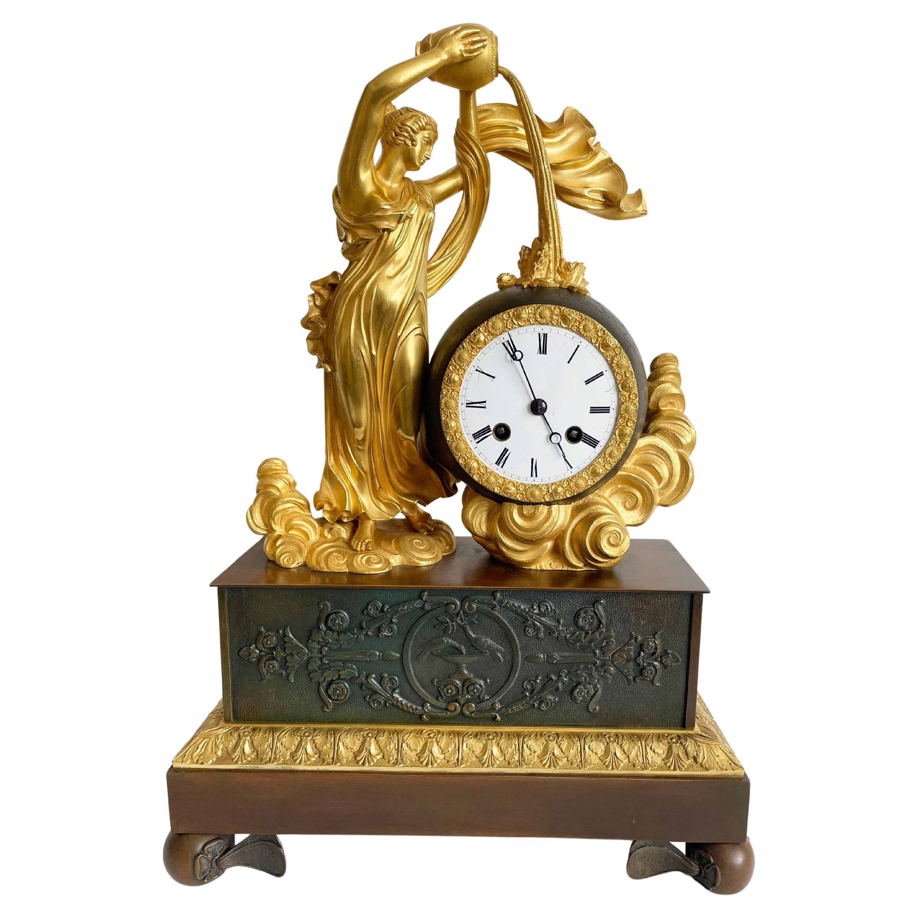 Empire Table Clock, Patinated and gilded bronze, Cleret, Paris, Circa 1825 For Sale