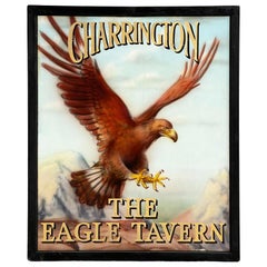 Insegna di un pub inglese: "Charrington - The Eagle Tavern".