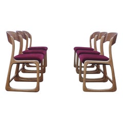 Set of 6 mid-century Baumann Sled chairs in beech & bordeaux velvet