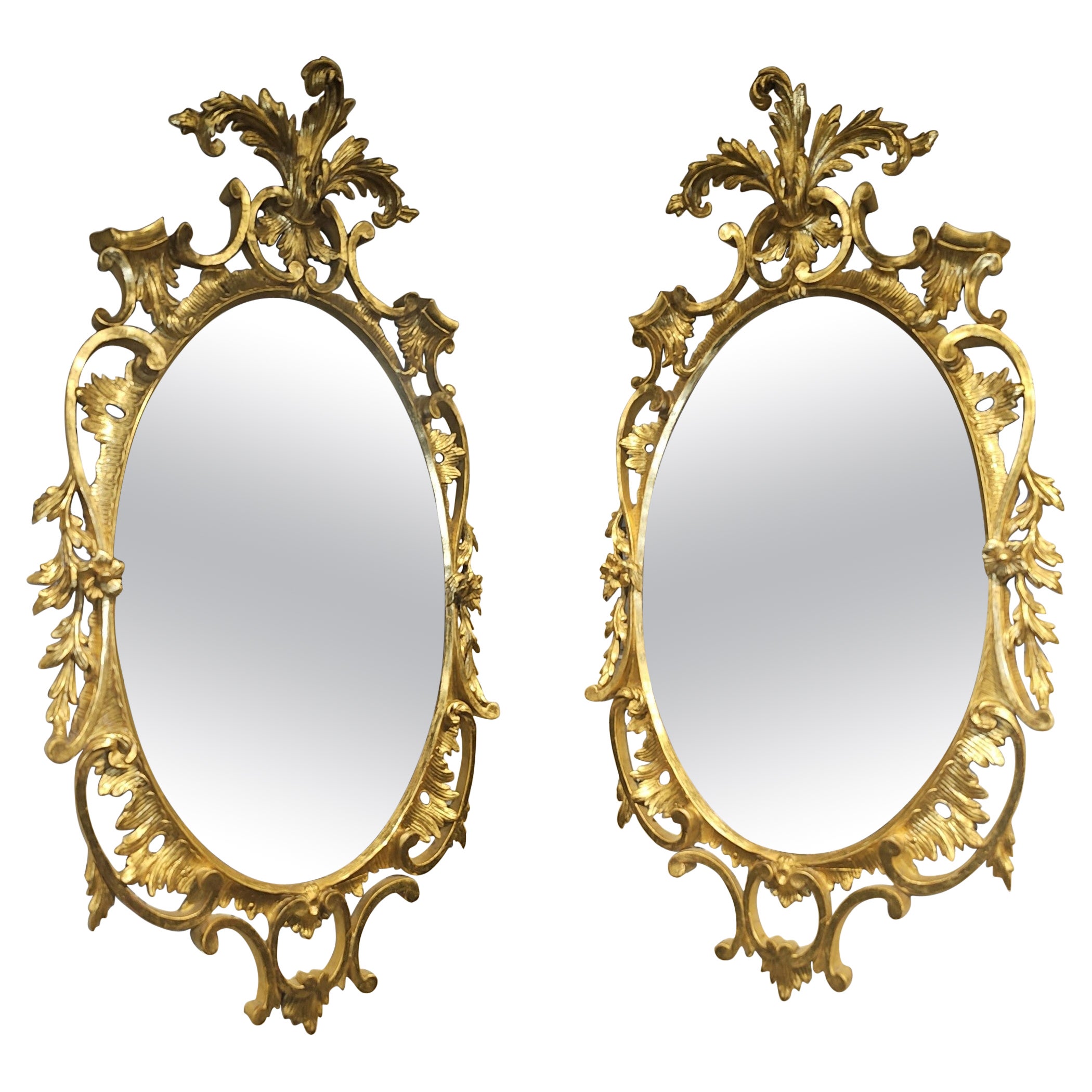 A pair of early 20th century Louis XV Style Gilt Frame Oval Mirror. Measure 20