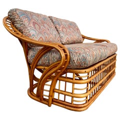 Vintage Coastal Style Rattan Loveseat by Whitecraft Rattan Inc, Miami. FL. Circa 1970s