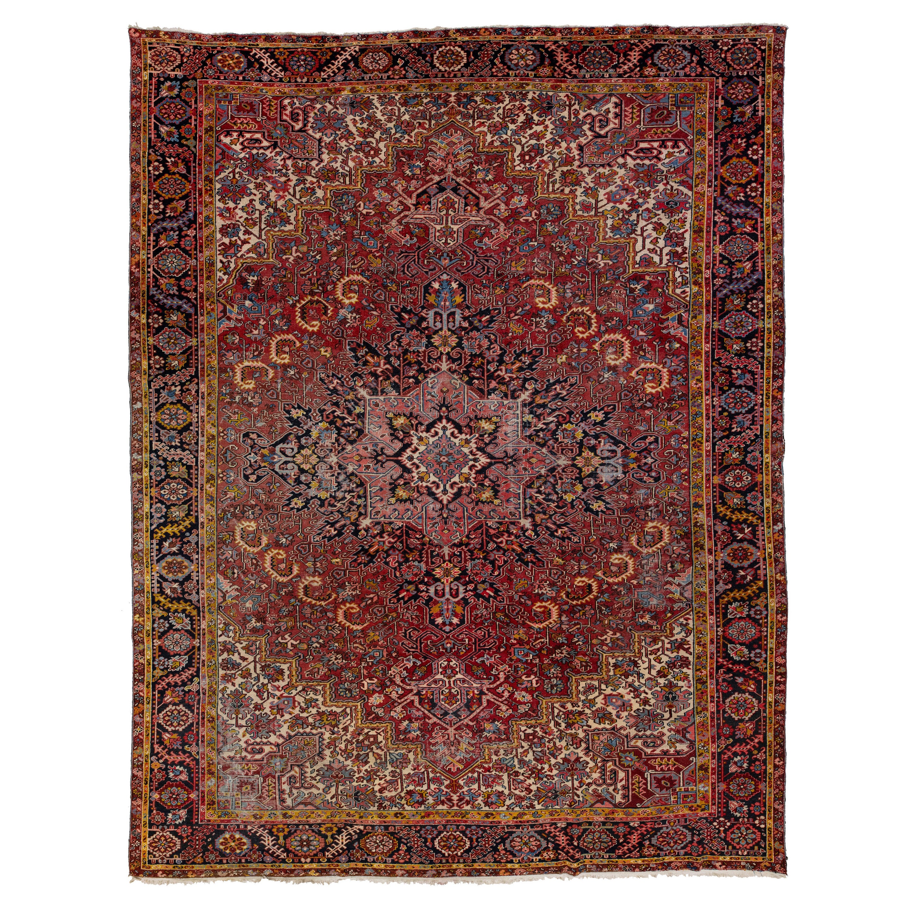 Antique Persian Heriz Wool Rug Featuring an Allover Motif In Red For Sale
