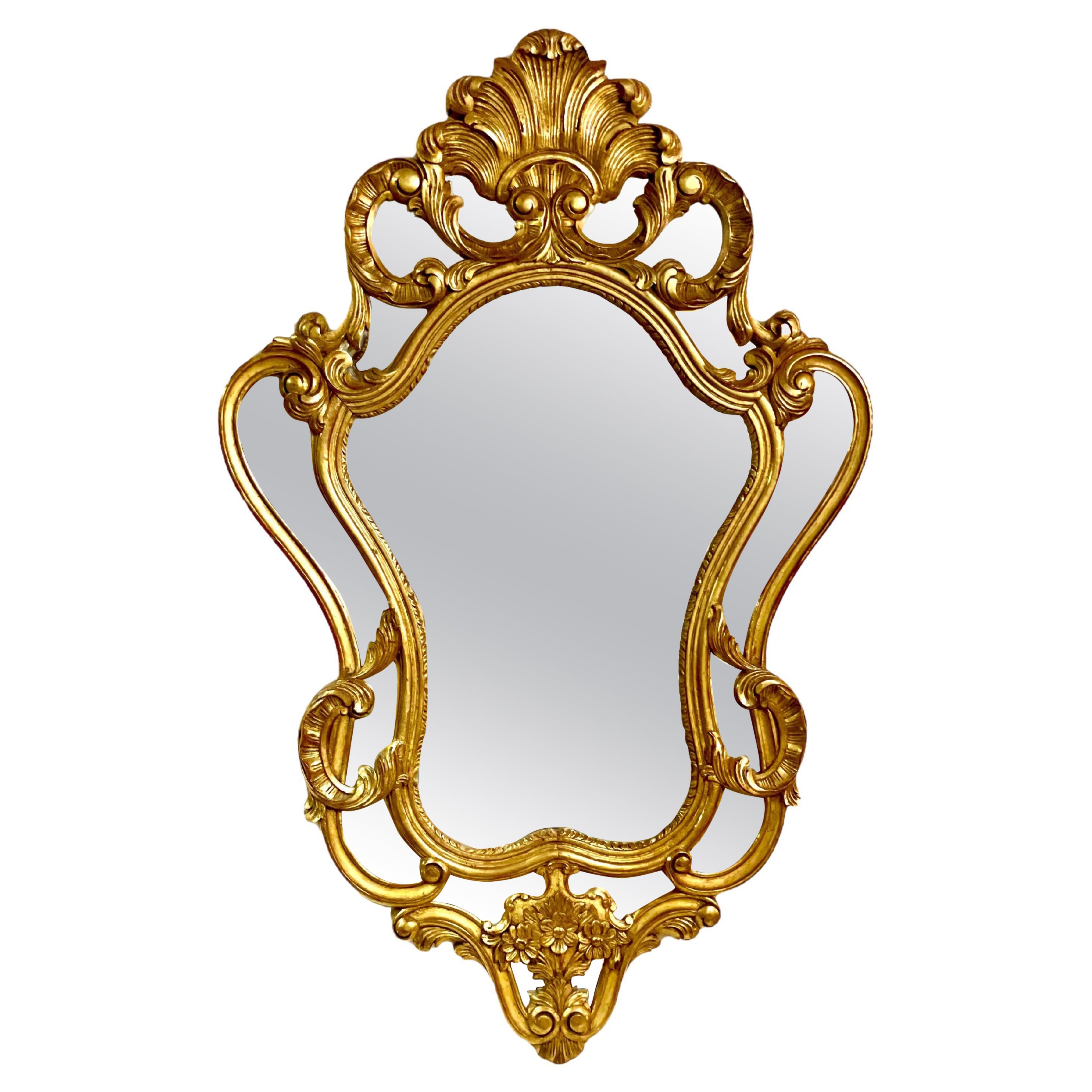 French Large Rococo Style Gilt Wall Mirror with Parecloses For Sale