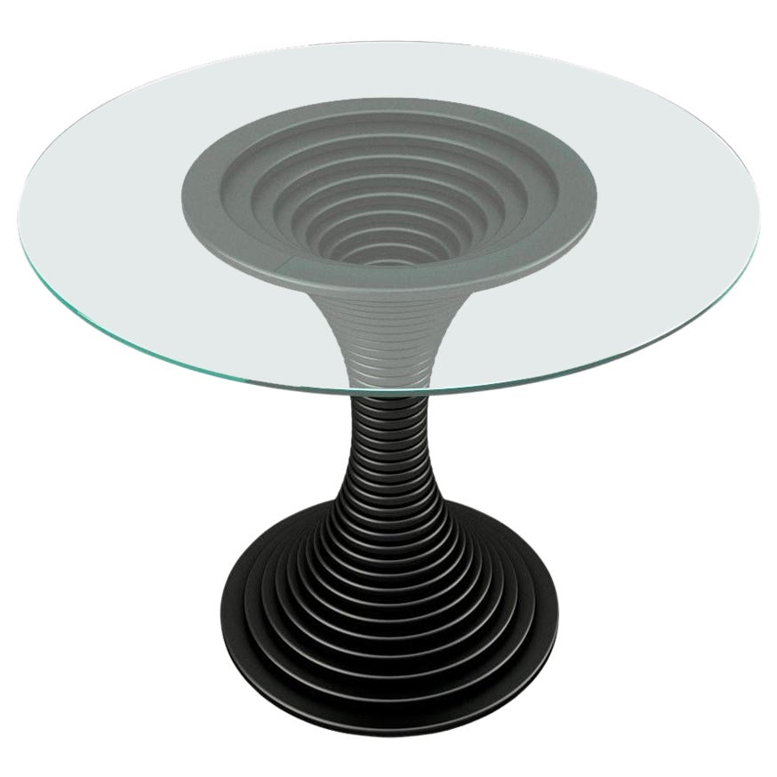 Vortex Mitteltisch – moderner schwarz lackierter Vortex-Mitteltisch mit Klarglasplatte