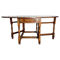 Vintage Handmade English Solid Oak Drop-Leaf Dining Table.