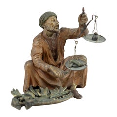 Orientalist  Cold Painted Vienna Bronze Man Holding Small Scale, Franz Bergmann