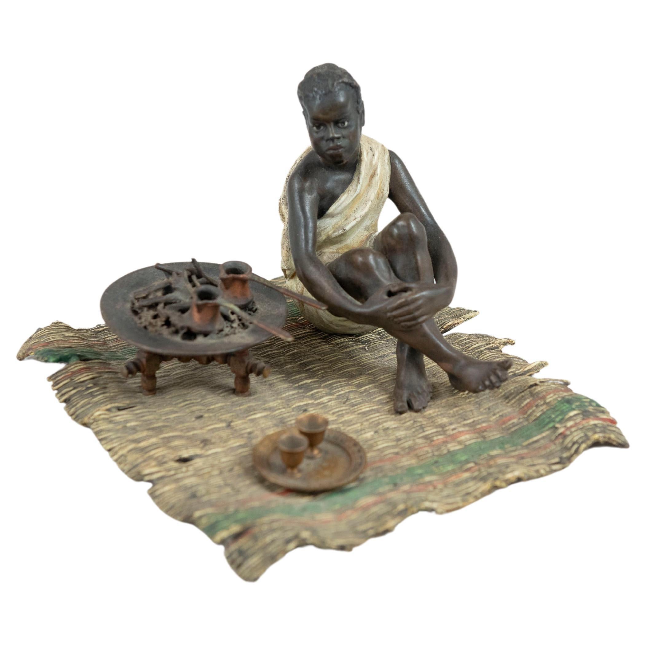 Cold Painted Austrian Orientalist Seated Young Boy Cooking, Bergmann Foundry For Sale