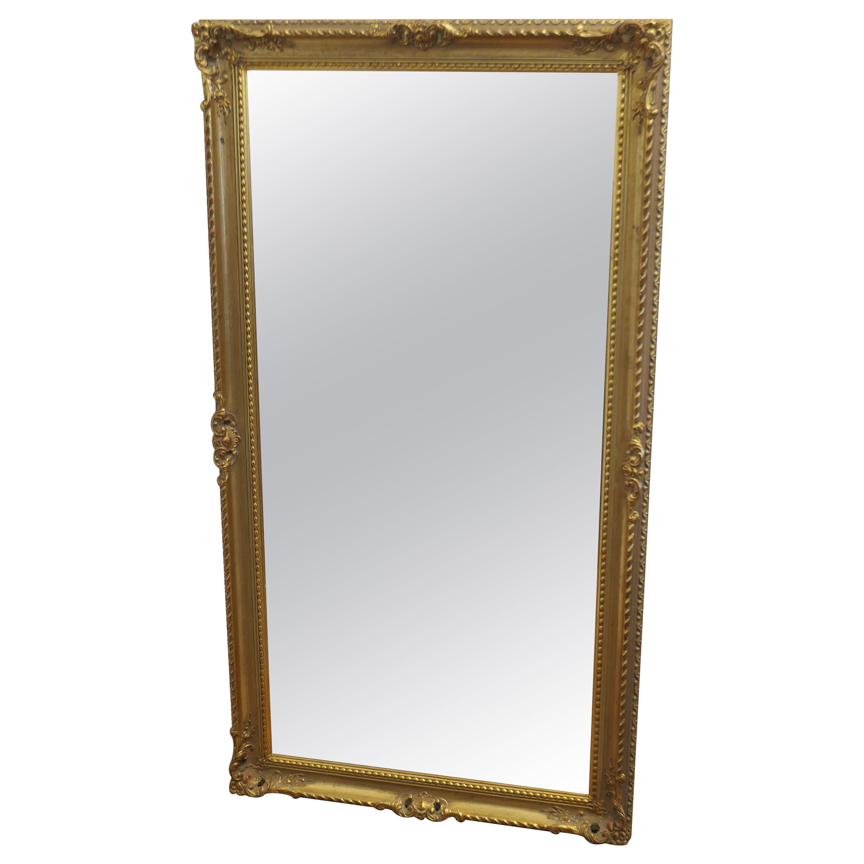 A Long Decorative Gilt Wall Mirror  A delightful piece  For Sale