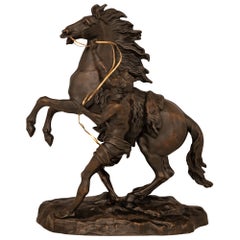 Französische patinierte Bronze- und Goldbronze-Statue eines Pferdes und eines Vaters aus dem 19. Jahrhundert