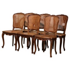 Antique Early 20th Century French Louis XV Carved Walnut Cane Dining Chairs, Set of 6
