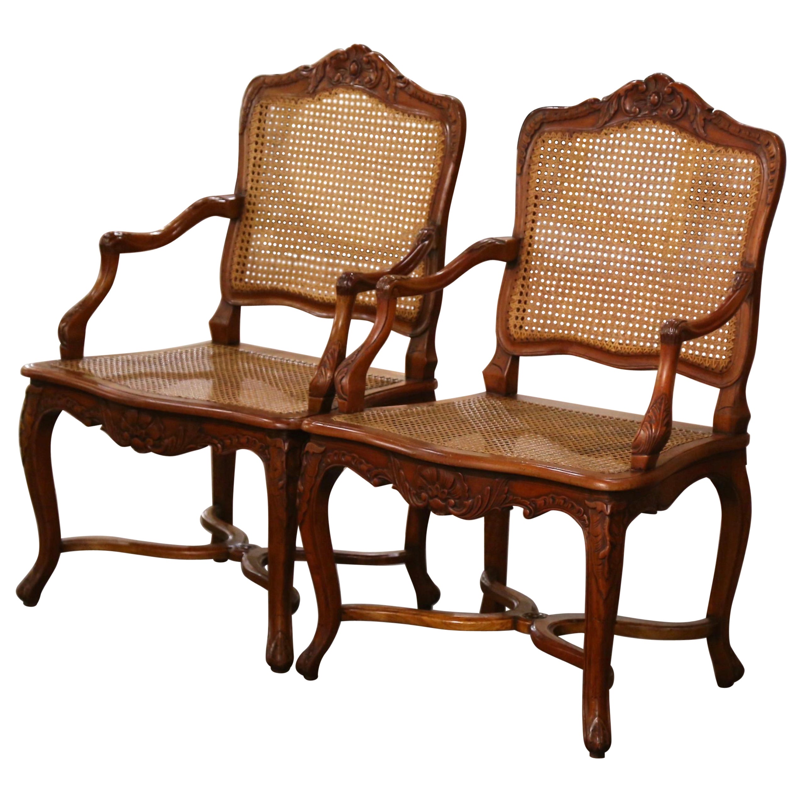 Pair of Vintage French Louis XV Carved Walnut and Cane Armchairs