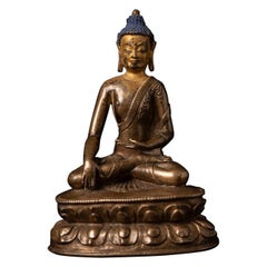 Très spéciale statue de Bouddha tibétain ancien du 15e siècle au Bhumisparsha Mudra