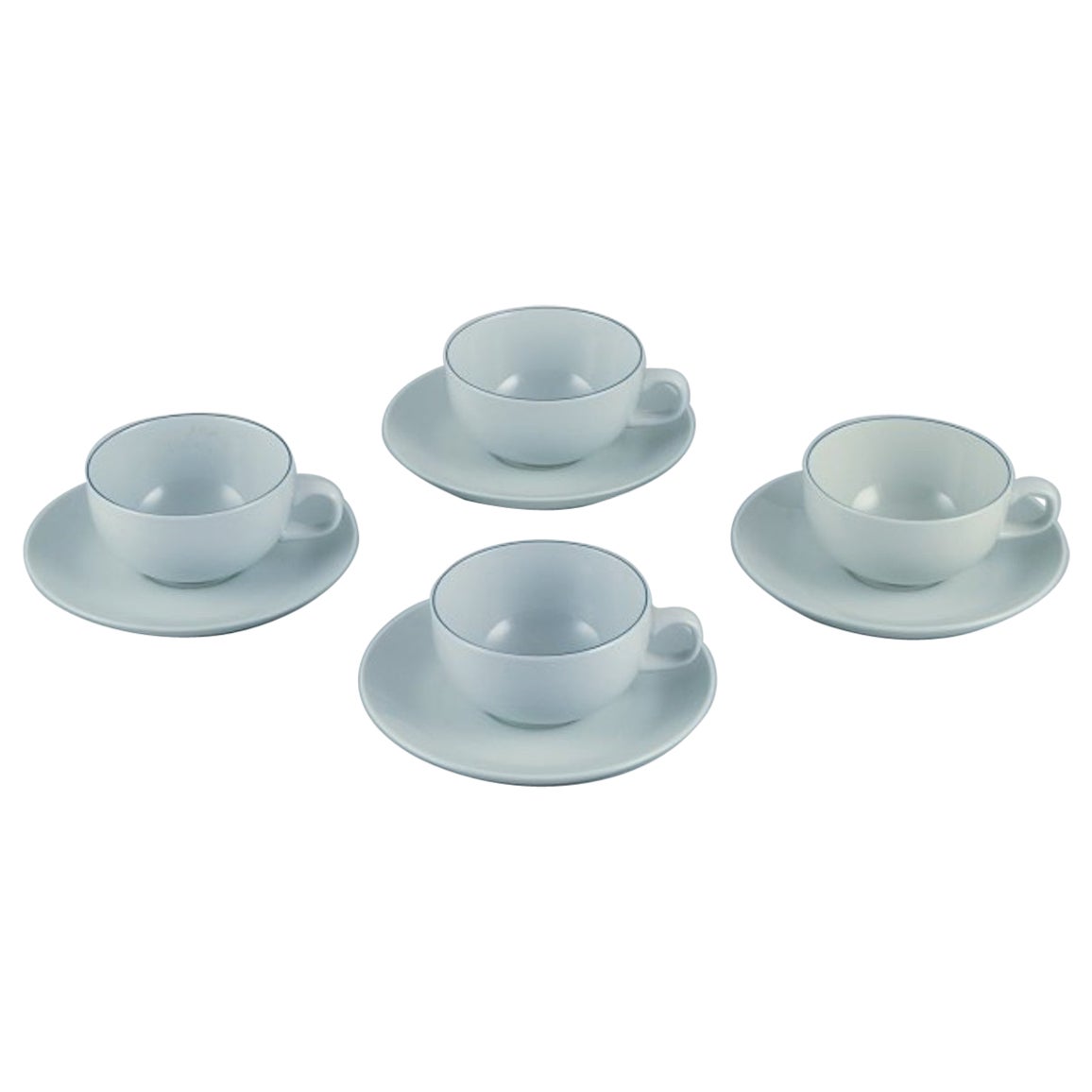 Grethe Meyer for Aluminia. Set of four Blue line coffee cups with saucers. For Sale