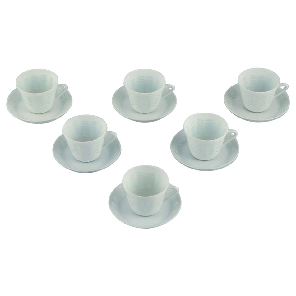 Friedl Holzer-Kjellberg, Arabia. Six coffee cups and saucers in rice porcelain. For Sale