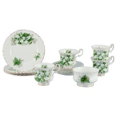 Vintage Royal Albert. Four "Trillium" coffee cups with saucers, cake plates, sugar bowl.