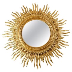 Grand miroir Soleil en Wood Wood doré, 20e siècle.