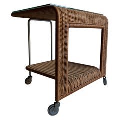 Vintage rattan trolley with glass top