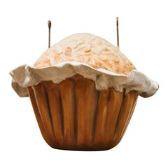 Retro giant cupcake, publicity sign from bakery shop 