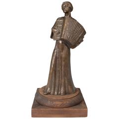 Sculpture en bronze de Lilian Swann Saarinen "Femme jouant de l'accordéon":: vers 1939