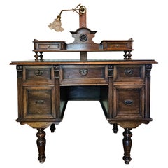 Venetian desk with glass top and directional light 20th century