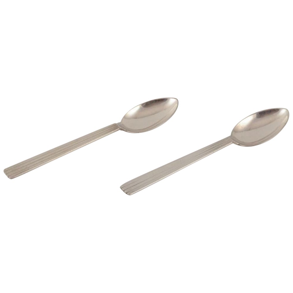 Georg Jensen, pair of Bernadotte dinner spoons in sterling silver.