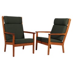 Hans J. Wegner highback lounge chair in teak and Hallingdal. 1970s model GE265