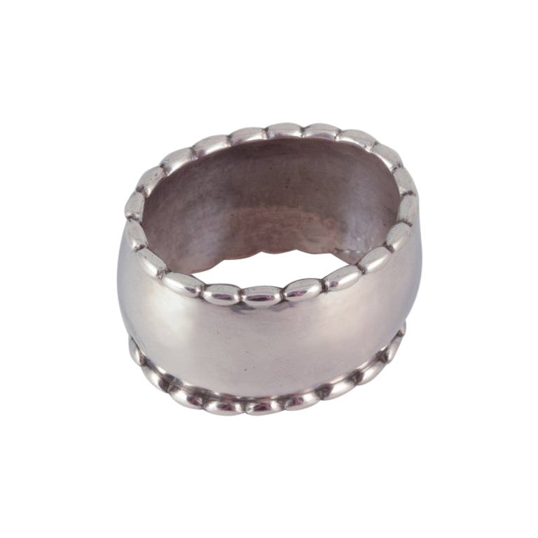 Rare and early Georg Jensen napkin ring in 830 silver.  For Sale