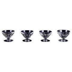 Retro Baccarat, France. Set of four Art Deco champagne coupes in crystal glass