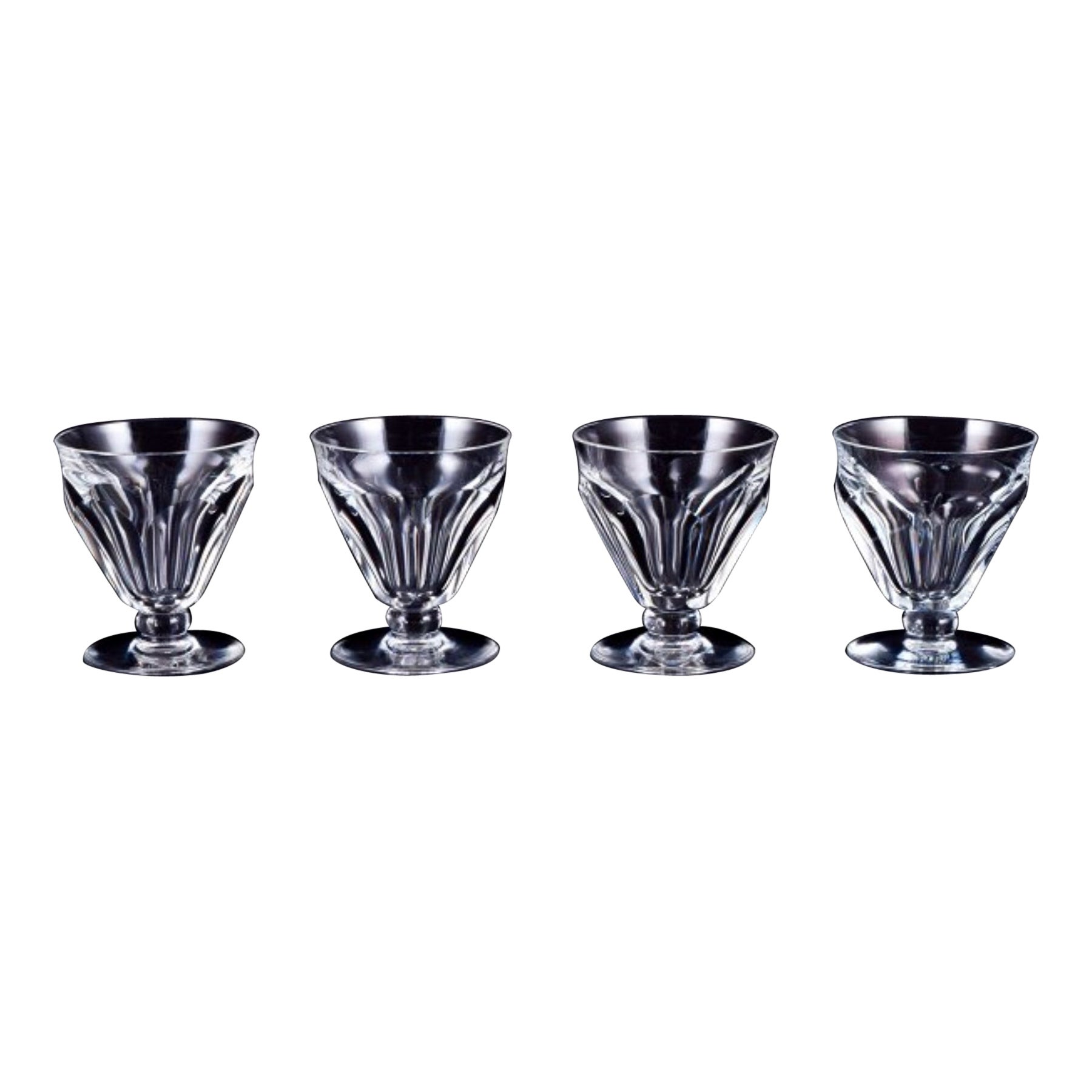 Baccarat, France. Set of four Art Deco white wine glasses in crystal glass