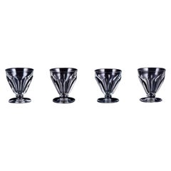 Baccarat, France. Set of four Art Deco red wine glasses in crystal glass