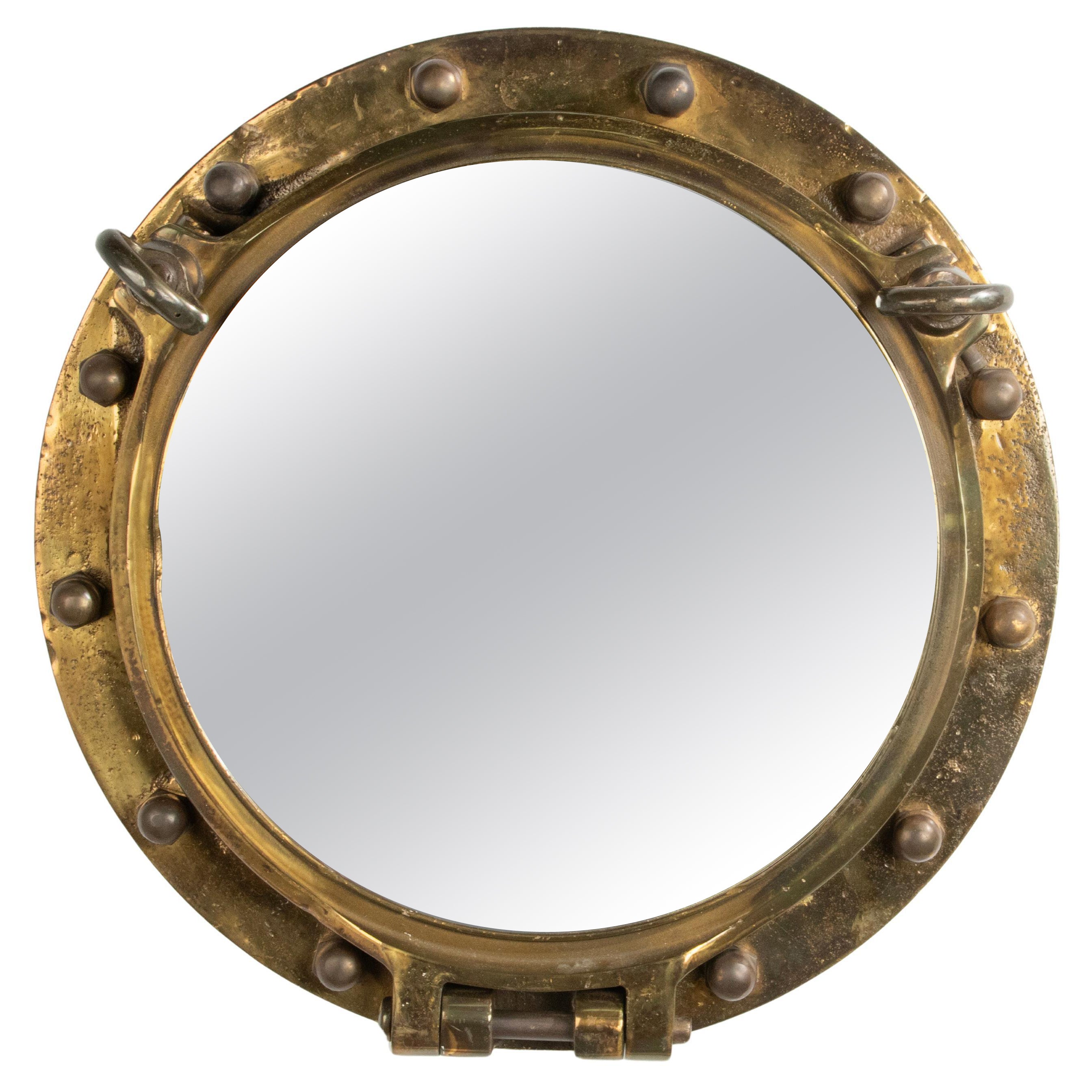 Early 20th Century Cast Brass Large Mirror Ship Porthole For Sale