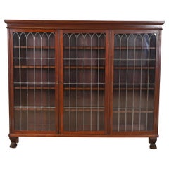 R.J. Horner Style Victorian Carved Mahogany Leaded Glass Triple Bookcase