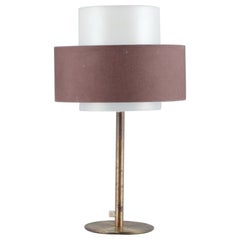 Retro Luxus, Sweden. Large table lamp in brass with shade in plastic and brown fabric.