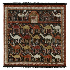 Rug & Kilim’s Tribal Style Rug in Black with Red, Gold-Brown Pictorial Patterns
