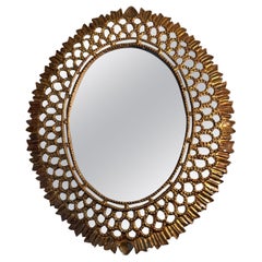 Miroir en bois doré de style Coloni espagnol