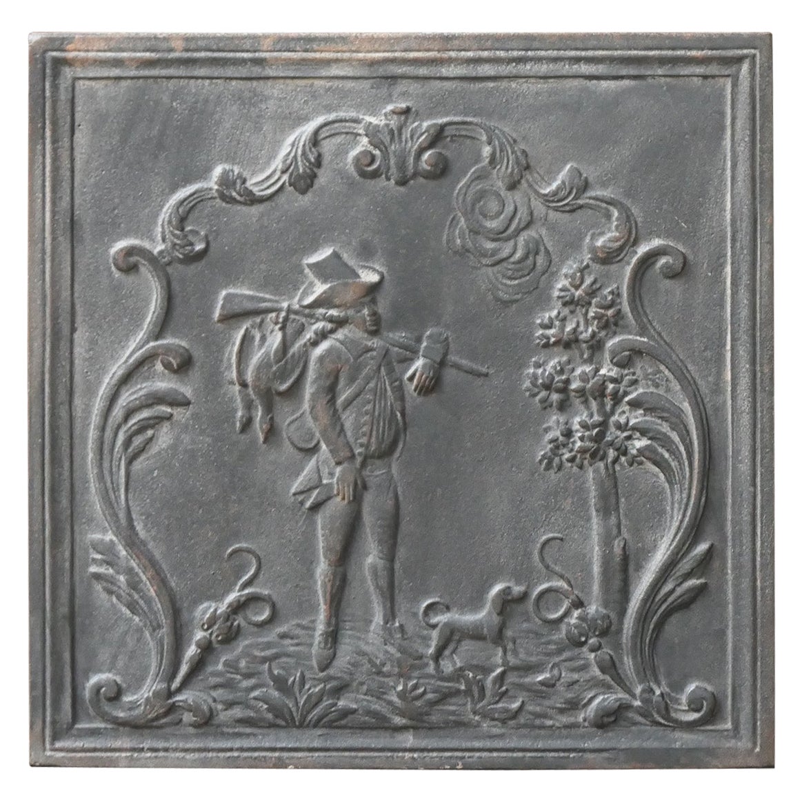 Plaque de cheminée / dosseret de style Napoléon III 'Retour de la chasse'.