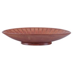Gunnar Nylund for Rörstrand. Large oval ceramic bowl with brown glaze