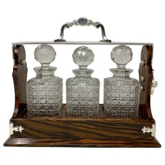 Antique English Silver Mounted Black Walnut 3 Bottle Tantalus, Circa 1880.