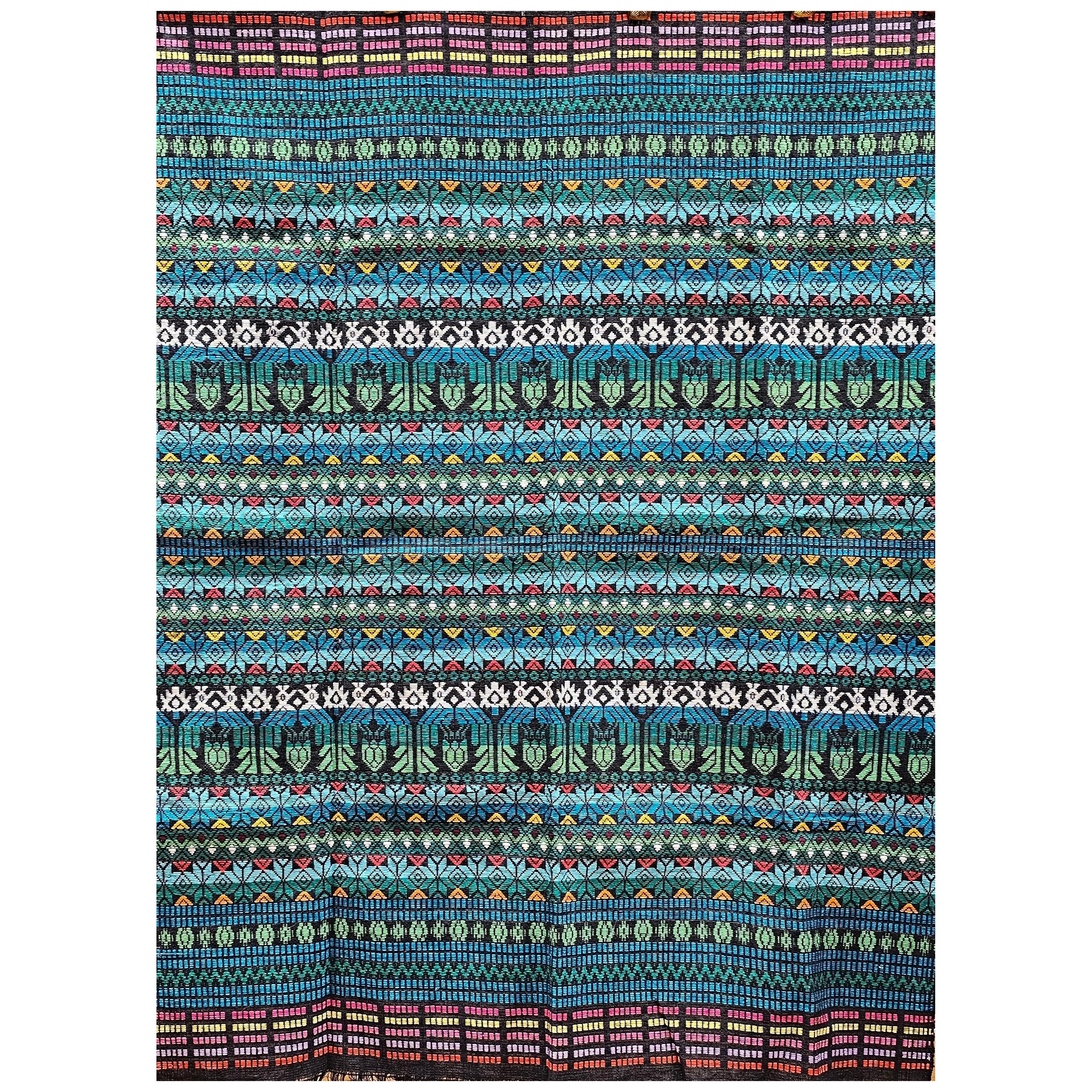 Panel textil sudamericano vintage tejido a mano en verde, azul, rojo y negro