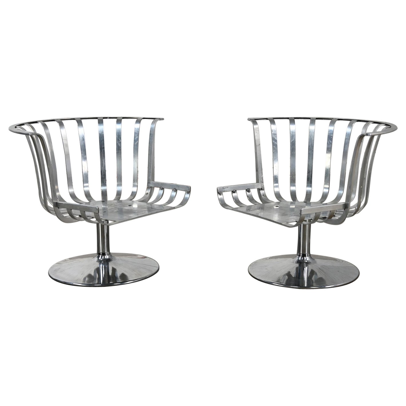 2 MCM Polished Aluminum Barrel Swivel Lounge Chairs Chrome Tulip Base by Woodard For Sale