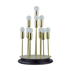 Retro Sülken Leuchten, Germany. Modernist lamp for ten bulbs. Brass on wooden base