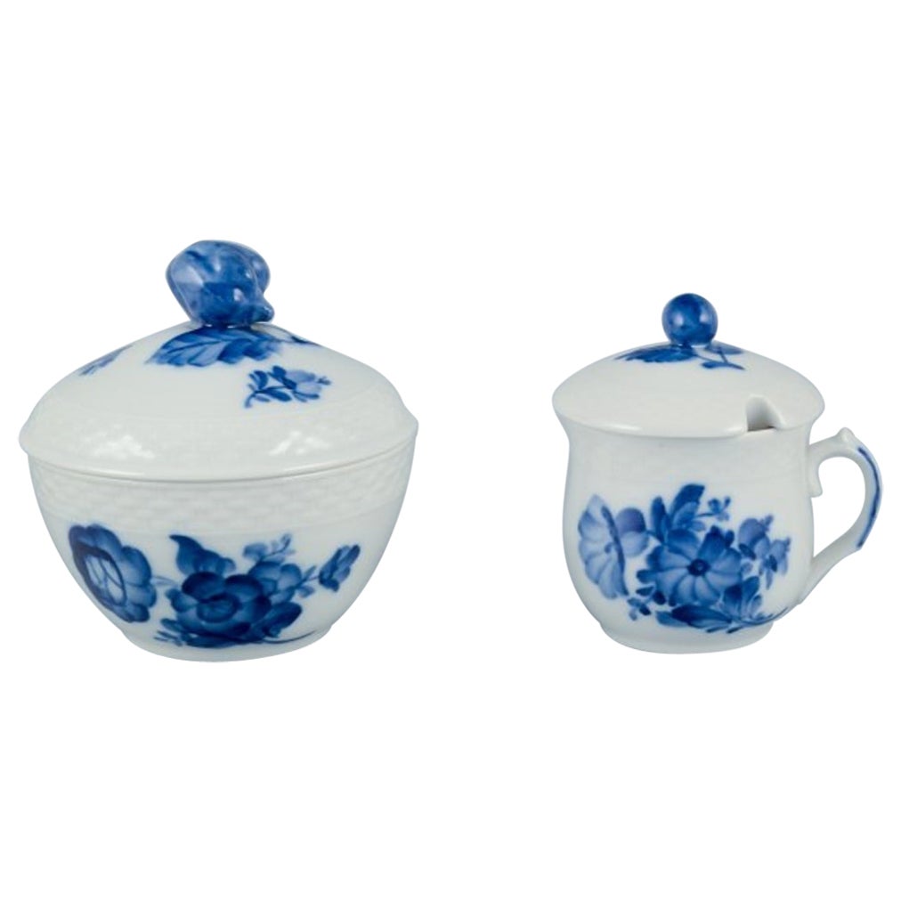 Royal Copenhagen Blue Flower Braided. Sugar bowl and bouillon cup in porcelain. For Sale