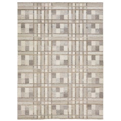 Tapis de style suédois moderne beige fait à la main avec un motif géométrique