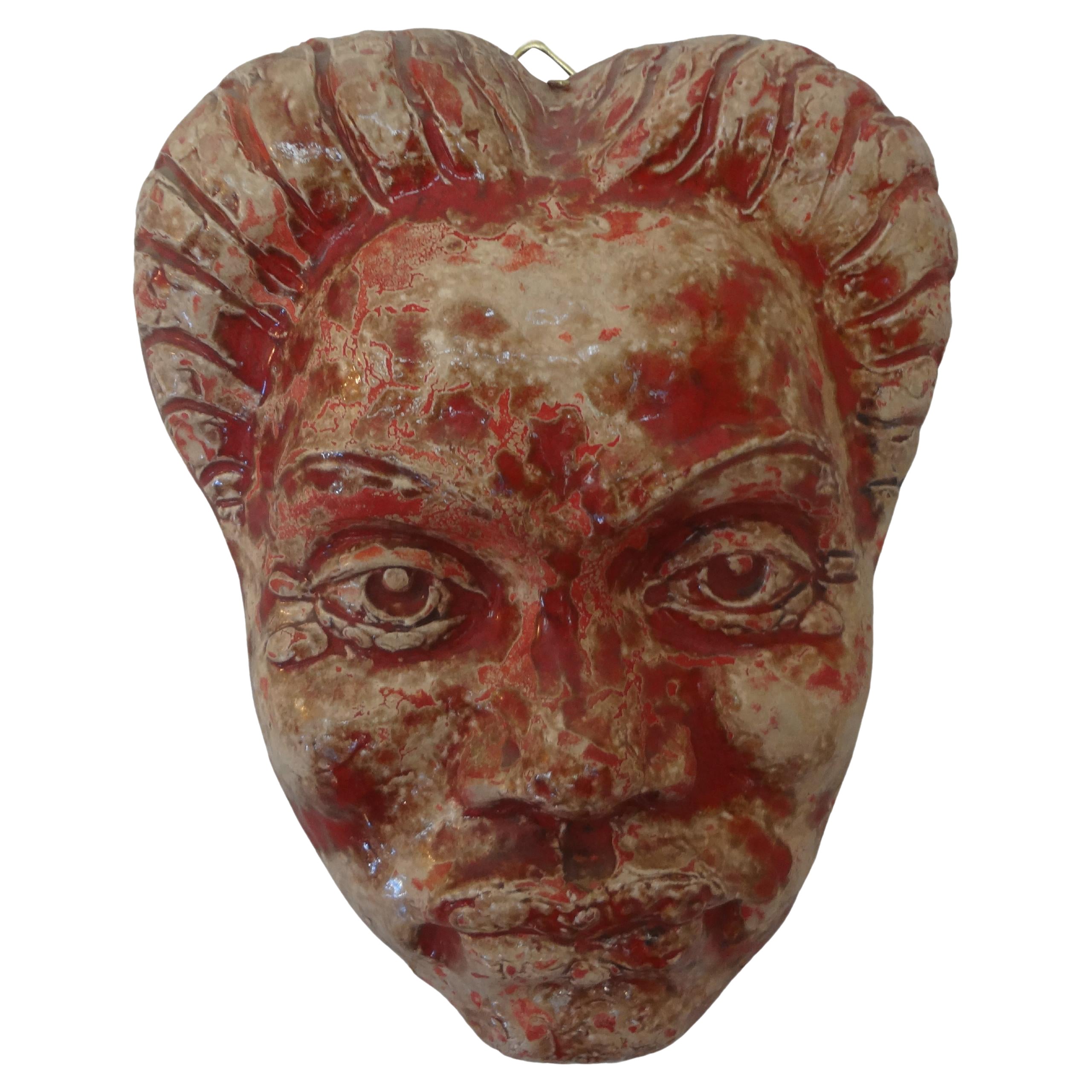 Escultura francesa moderna de terracota vidriada con máscara facial