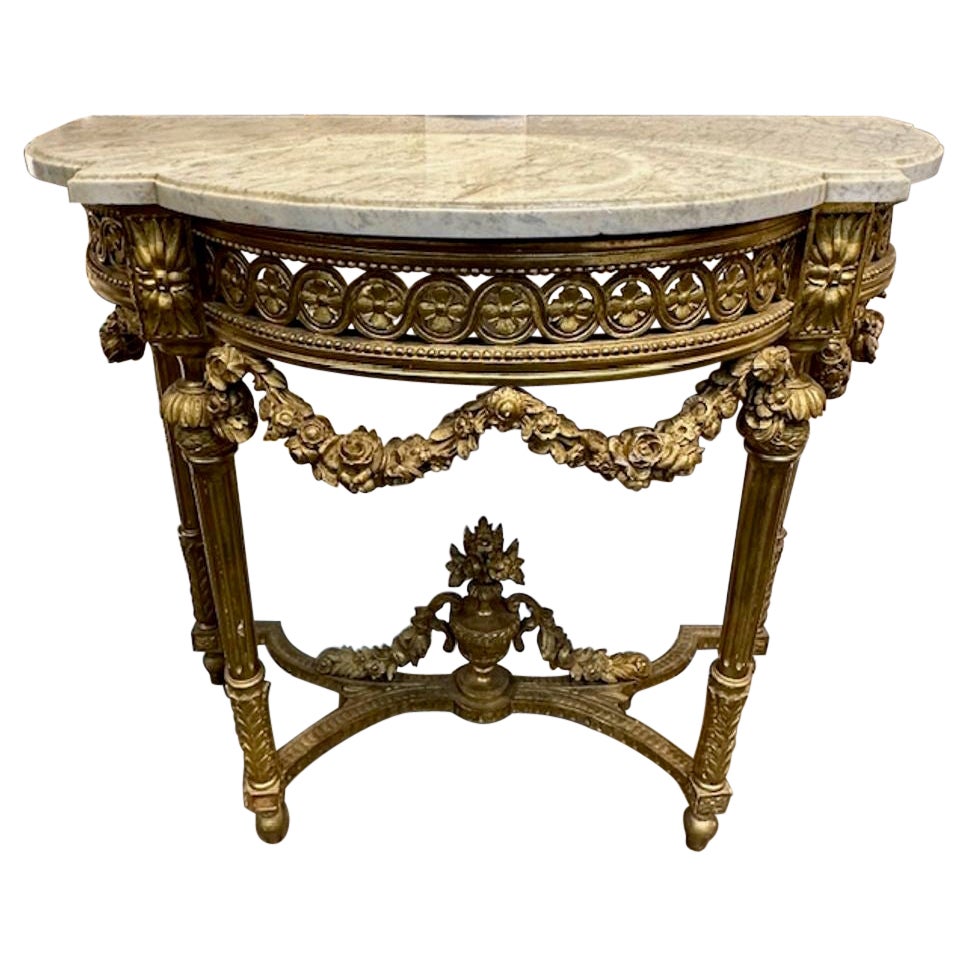 Console française Louis XVI en bois doré