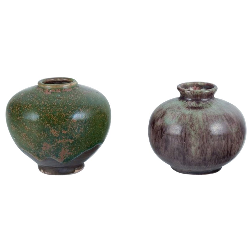 Elly Kuch and Wilhelm Kuch, Germany. Two ceramic vases in green and brown tones