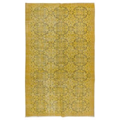 Alfombra turca hecha a mano en amarillo, ideal para interiores modernos