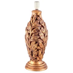 Grande lampe de table italienne en céramique. En forme de branches avec des décorations dorées. 