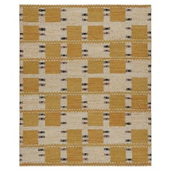 Tapis de style scandinave à motifs géométriques dorés de Rug & Kilim 