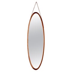Retro 1960s oval wall mirror in wood Italian design